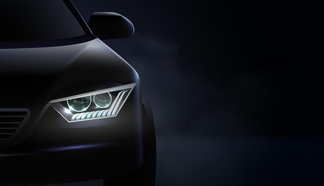 Car headlights close up in green and purple light representing Cash for Cars West Coast